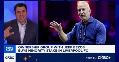 Group including Jeff Bezos buys minority stake in Liverpool FC, with option to become controlling owner